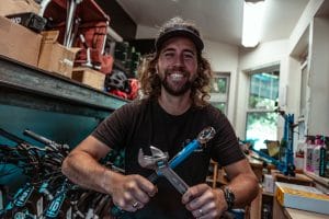 Brendan and tools fixing your eBike on Bowen Island. Bike maintenance Bowen Island.